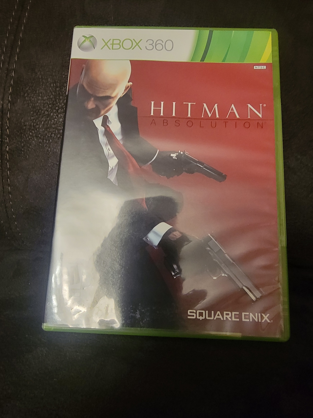 Hitman: Absolution - Xbox 360 Video Game (Red) by Square Enix